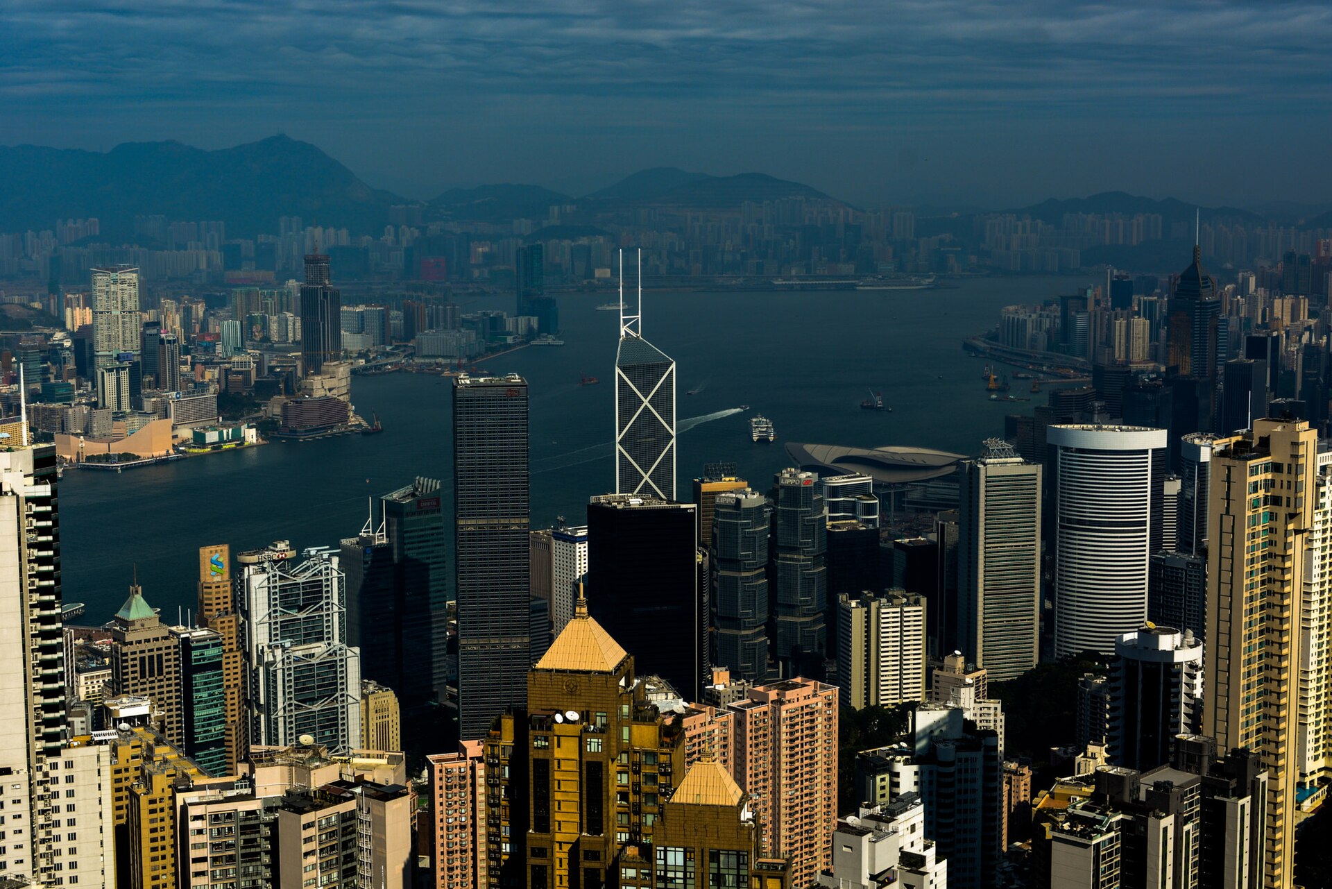 Central's towers and Victoria Harbour from Victoria Peak in the late afternoon, the Bank of China Tower at the centre
