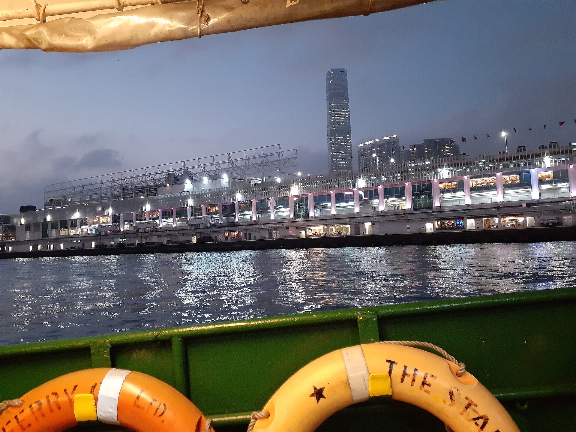 Dusk from a Star Ferry off Tsim Sha Tsui: Ocean Terminal and the International Commerce Centre across the water